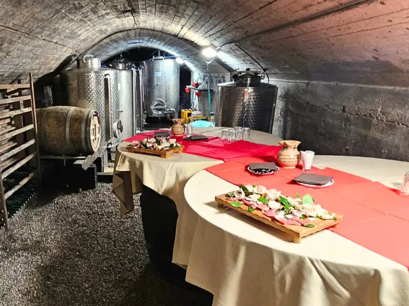 Decorated wine cellar table for New Year's Eve dinner at farmhouse