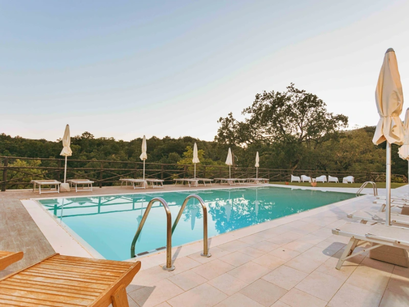 Summer evening illuminated pool farmhouse Campania